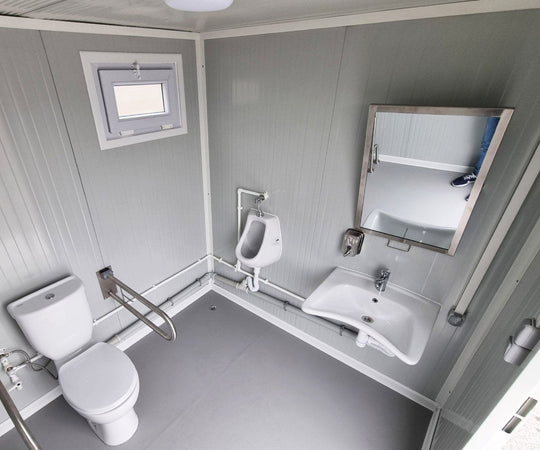 Contenedor sanitario accesible para personas con discapacidad, con rampa y agua caliente